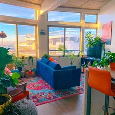 Boho home decor in a Denver apartment next to Mile High Stadium related to Enhancing Your Space with the Vibrant Flair of Orange Curtain Valances