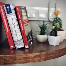 books on brown wooden table related to The Ultimate Guide to Corner Bunk Beds: Maximizing Space and Style