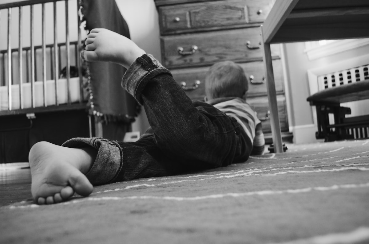 Boy playing in his room related to Under the Bed Safe: The Ultimate Solution for Hidden Security