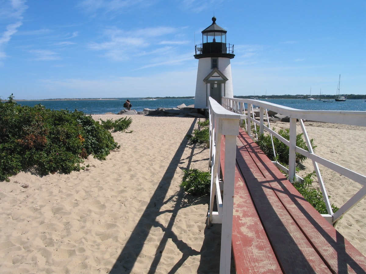 Brant Point Lighthouse Nantucket - Notice the hugging couple. related to Experience the Charm of Nantucket: Nantucket Bed and Breakfast