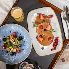 breakfast in bed
 related to The Best Hilton Head Bed and Breakfasts for a Cozy Coastal Getaway