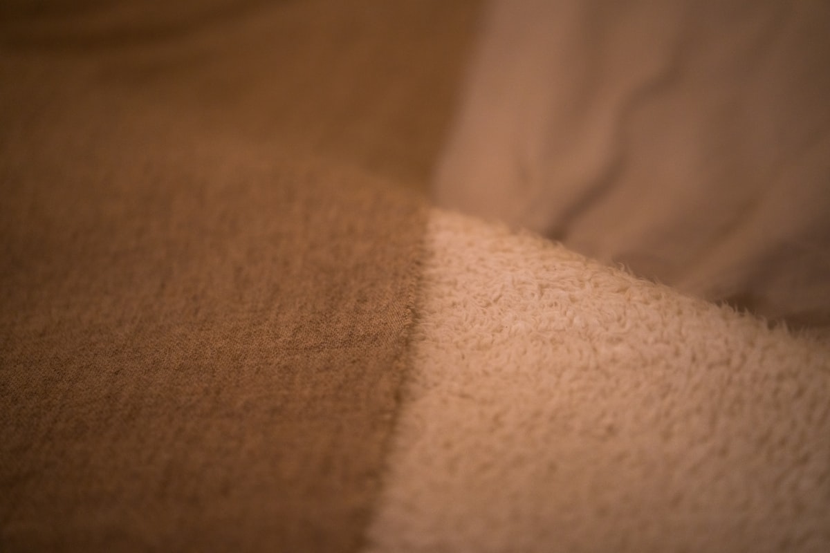 brown and white stripe textile related to The Ultimate Guide to Fleece Bed Sheets: Benefits, Types, and Care