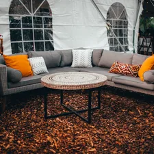 brown wooden coffee table near white couch related to Enrich Your Outdoor Ambiance: The Beauty of Home Depot Chiminea Clay