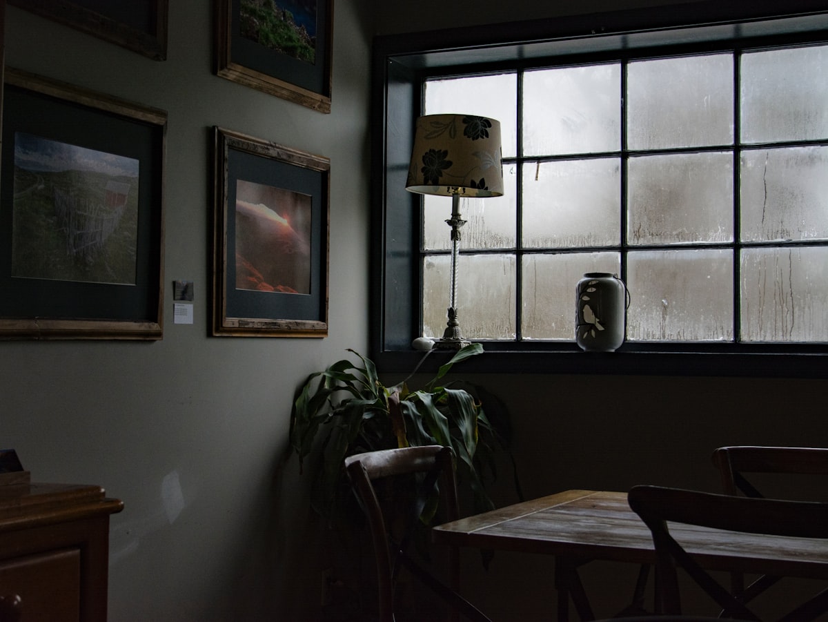 brown wooden table with chairs related to Elevating Your Windows: The Art of Choosing the Perfect Valance