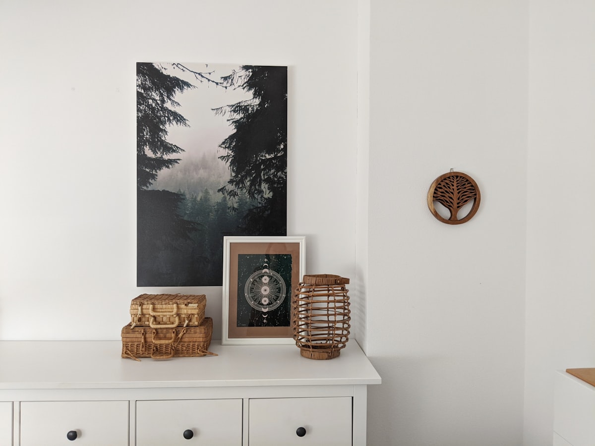 brown woven basket on white wooden drawer related to White Sideboard Buffet: A Timeless Statement for Your Dining Room