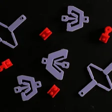 Building blocks made out of rubber ready to be assembled to form larger structure with counter-intuitive mechanical properties related to Mini Blind Valance Clips: Hidden from View