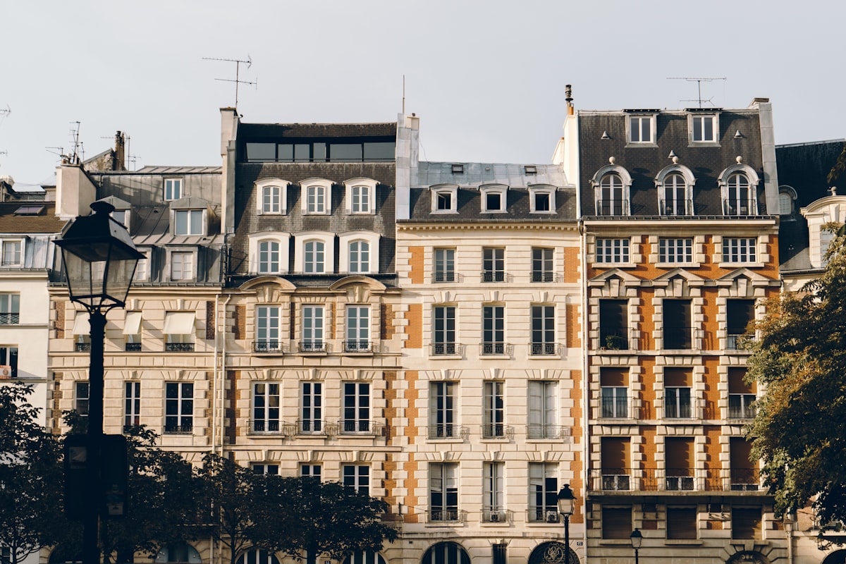 building with windows related to Charming Stays in the City of Lights