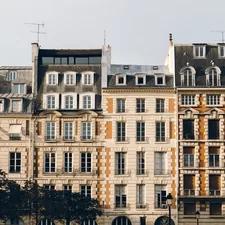 building with windows related to Charming Stays in the City of Lights