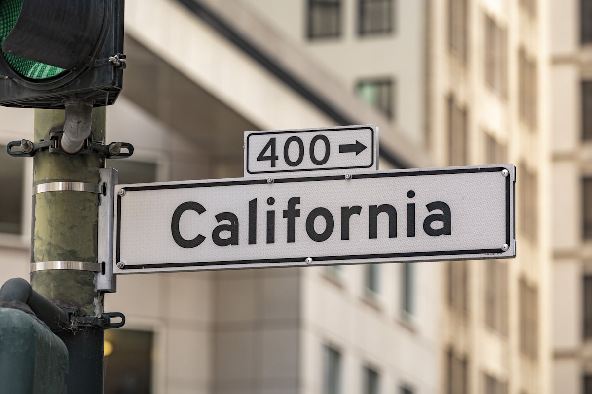California street sign with building in background related to Understanding California King Bed Dimensions