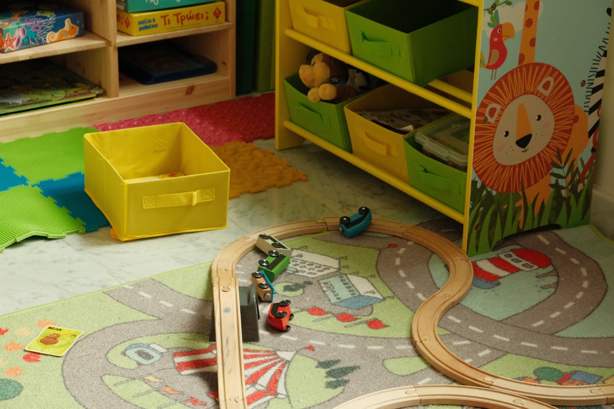 Children's playroom with toy train and storage related to Transform Your Child's Room with Disney Frozen Bedding