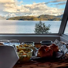 clear glass bowl on brown wooden table related to Luxurious Lodging & Morning Delights: Immerse Yourself at Hermann Mo Bed and Breakfast