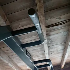 close up, bokeh, macro, blur, blurred background, close focus, weight training, gym, weights, gym equipment, working out, home gym, exercise, garage gym, body building, progressive weight training,
 related to Elevating Safety: The Importance of Bunk Bed Ladder Hooks