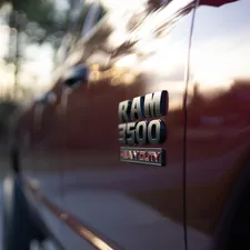 Close-up of a ram 3500 truck emblem. related to Ultimate Guide to Bed Covers for Your RAM 1500