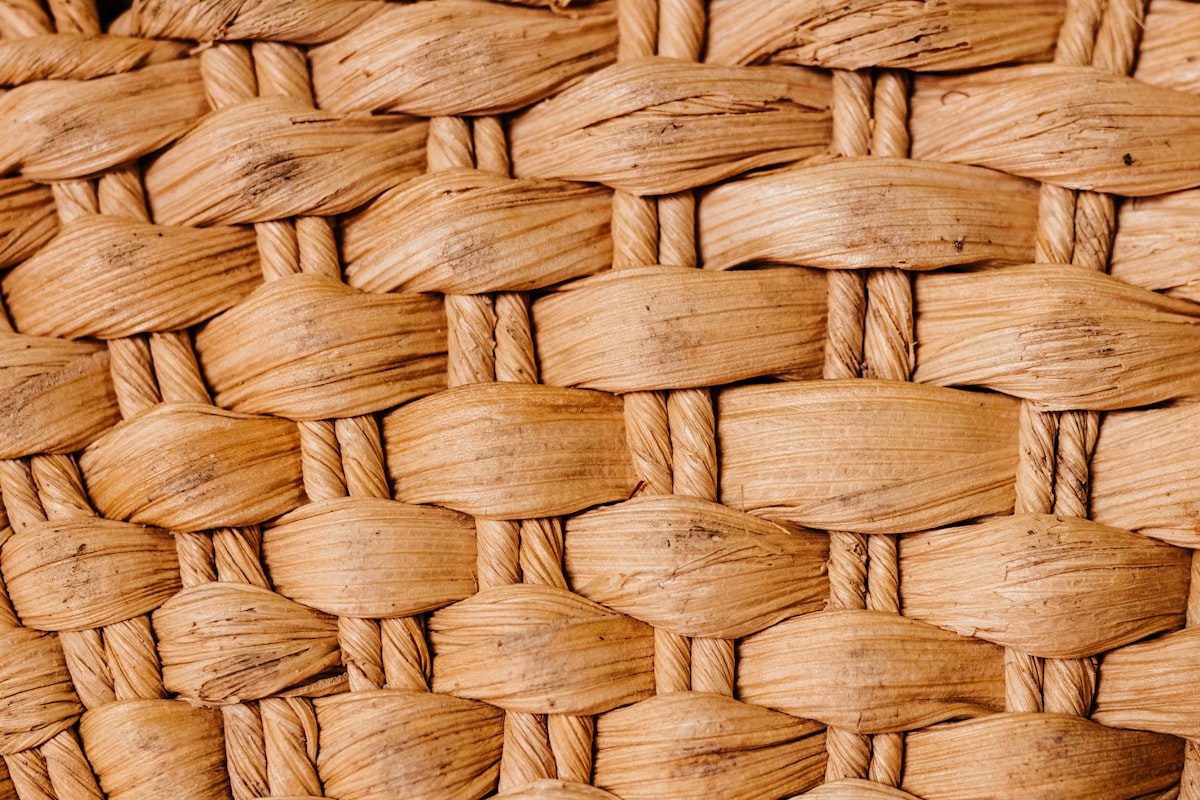 Close-up of a woven natural fiber basket texture. related to The Ultimate Guide to Wicker Dog Beds