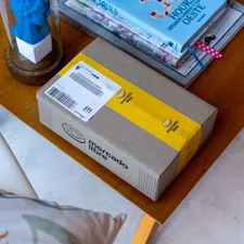 Coffee table books and mail package.  related to The Ultimate Guide to Buying a Mail Order Bed: Comfort Delivered to Your Doorstep