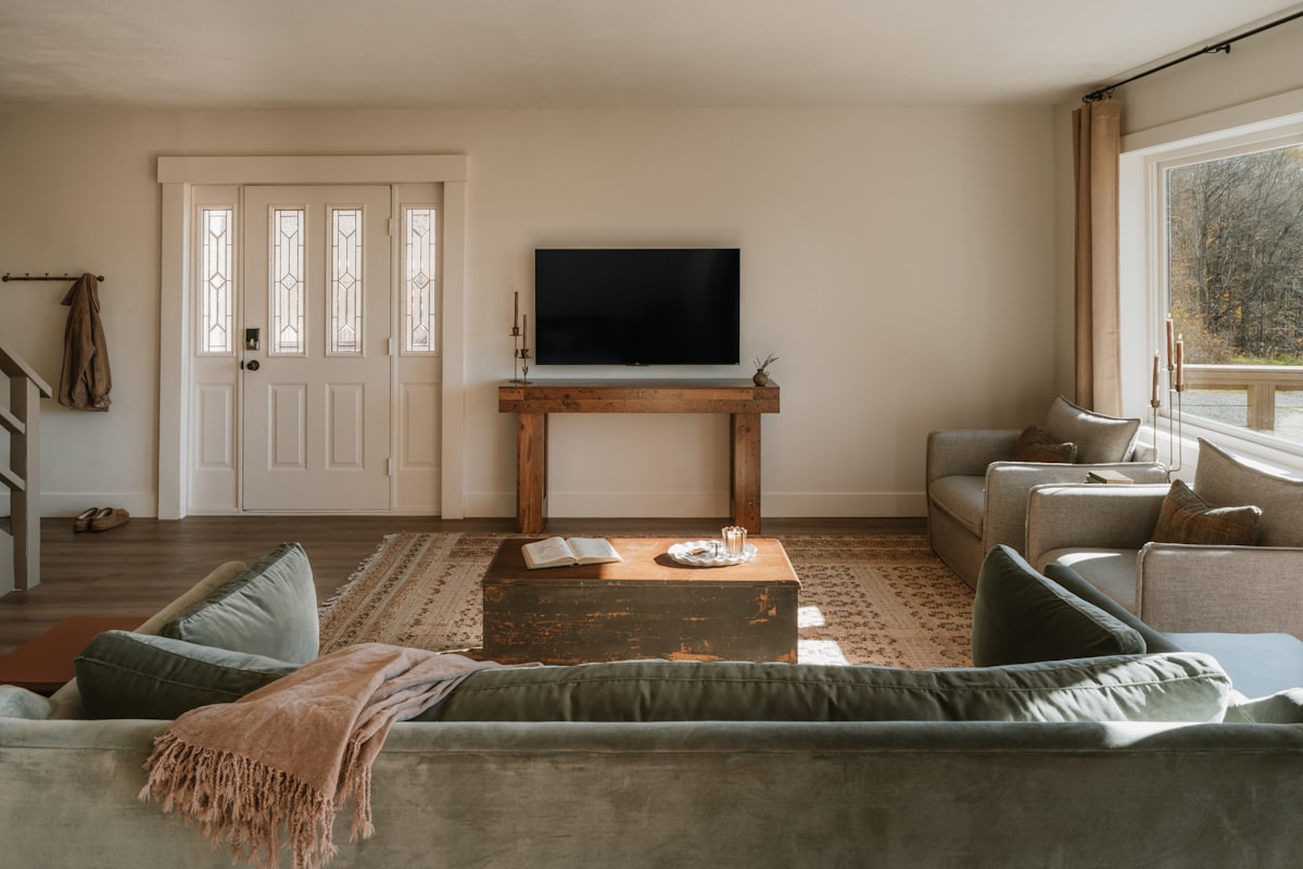 Cozy living room (IG: @clay.banks) related to Elevate Your Home's Curb Appeal with the Perfect Entryway Console Table