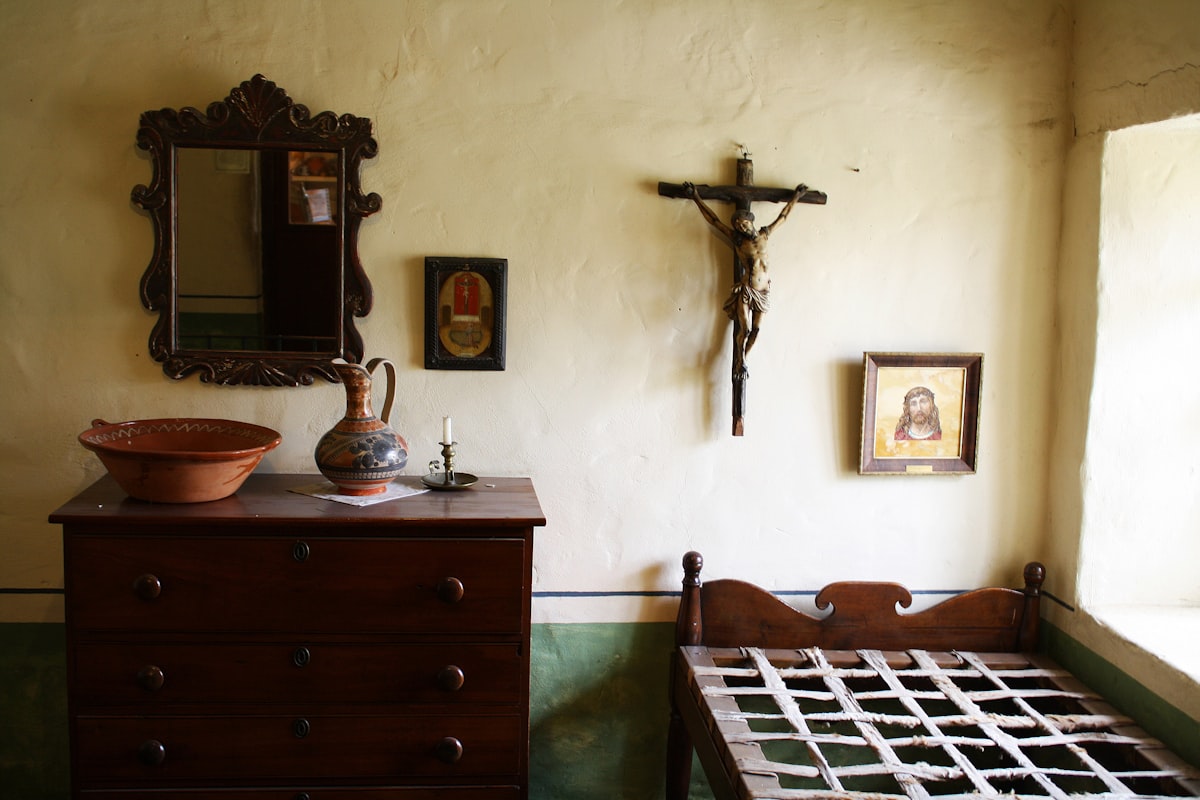 crucifix, mission, padre, Junipero Serra, San Carlos de Borromeo de Carmelo, Catholic, Catholicism, religion, religious, Carmel, Carmel-by-the-Sea, San Carlos, Serra, bedroom, mission system, mirror related to Cozy Retreats at Carmel Bed and Breakfast