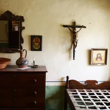 crucifix, mission, padre, Junipero Serra, San Carlos de Borromeo de Carmelo, Catholic, Catholicism, religion, religious, Carmel, Carmel-by-the-Sea, San Carlos, Serra, bedroom, mission system, mirror related to Cozy Retreats at Carmel Bed and Breakfast