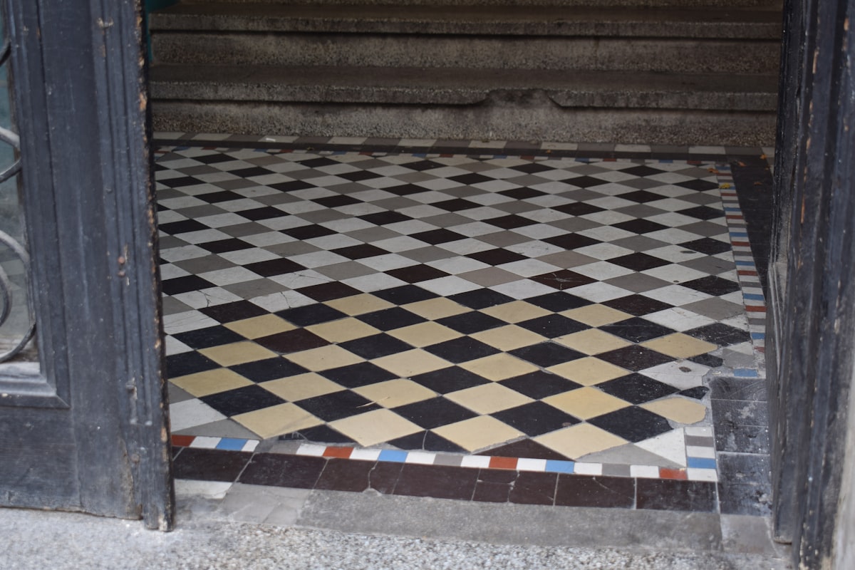 Diamond patterned tiles on a floor related to Timeless Elegance: Elevating Your Home with Slate Tile Entryway