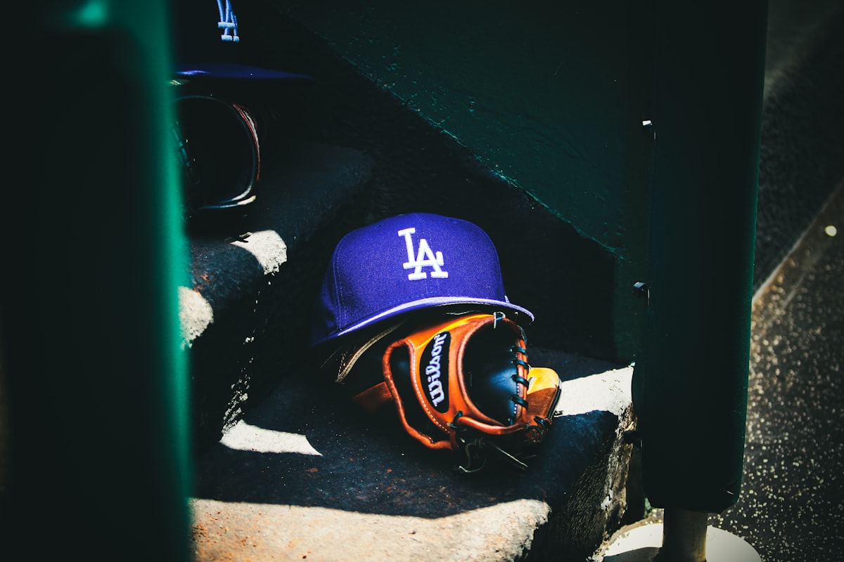 Dodgers hat rests on the dugout steps.
if photo is used, please provide the following photo cred:
Photo by Desmond A. Hester // @dezhester related to The Dodger's Dream: Unraveling the Magic of Dodger's Bed Set