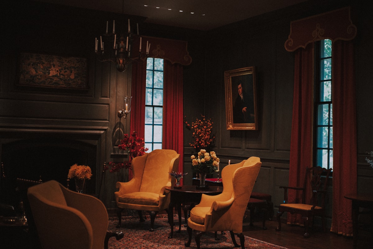 Elegant living room with yellow armchairs and fireplace. related to Elegant Living Room Drapes and Valances for a Stylish Space