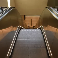 Empty escalator related to Elevate Your Space: The Ultimate Guide to Lift Bed Frames