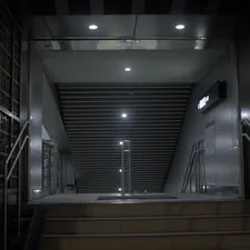 Empty industrial elevator shaft with lights related to The Ultimate Guide to the Bed Bug Registry