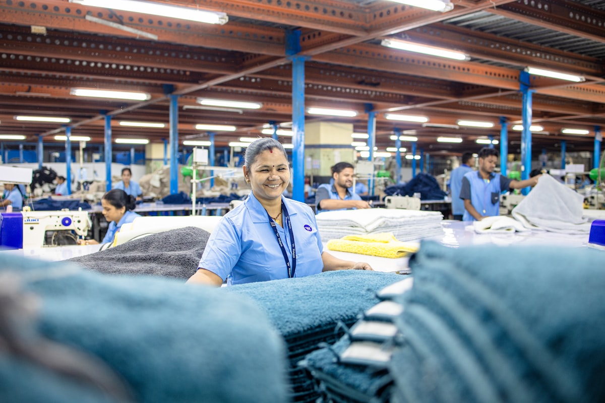 Factory workers are busy in a textile factory. related to Discover Empowering Opportunities at Bed Bath & Beyond