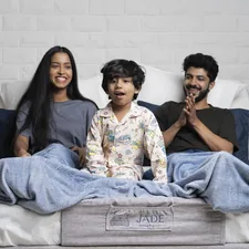 Family on an adjustable bed related to Elevate Your Sleep Sanctuary: The Underrated Power of Elasticated Bed Valances