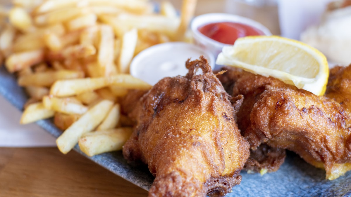 fried chicken with fries and sauce related to The Ultimate Guide to Bed Stuy Fish Fry Menu