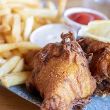 fried chicken with fries and sauce related to The Ultimate Guide to Bed Stuy Fish Fry Menu