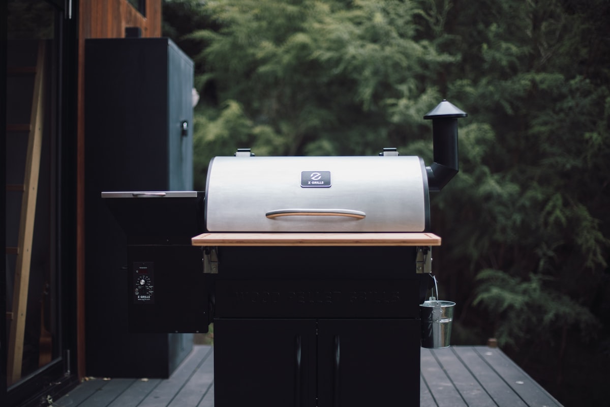 Front view of the flagship Z Grills pellet smoker grill related to Chiminea on Deck: Enhancing Your Outdoor Living