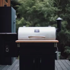 Front view of the flagship Z Grills pellet smoker grill related to Chiminea on Deck: Enhancing Your Outdoor Living
