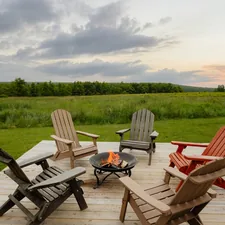 Gather around the fire (IG: @clay.banks) related to Cozy Up Outdoors: The Ultimate Guide to Large Chiminea Outdoor Fireplaces