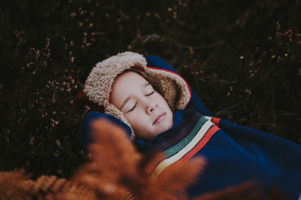 girl wearing blue jacket related to Cozy Dreams for Little Ones