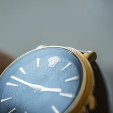 gold and silver analog watch related to Luxurious Comfort: Exploring Versace Bedding Sets