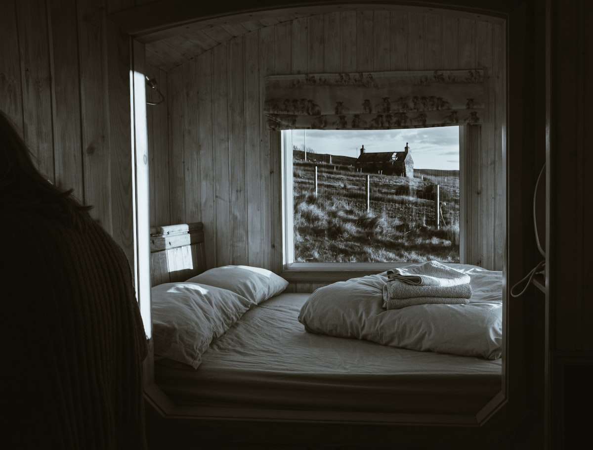 grayscale photo of bed with pillows related to Bed Bath & Beyond Window Valances