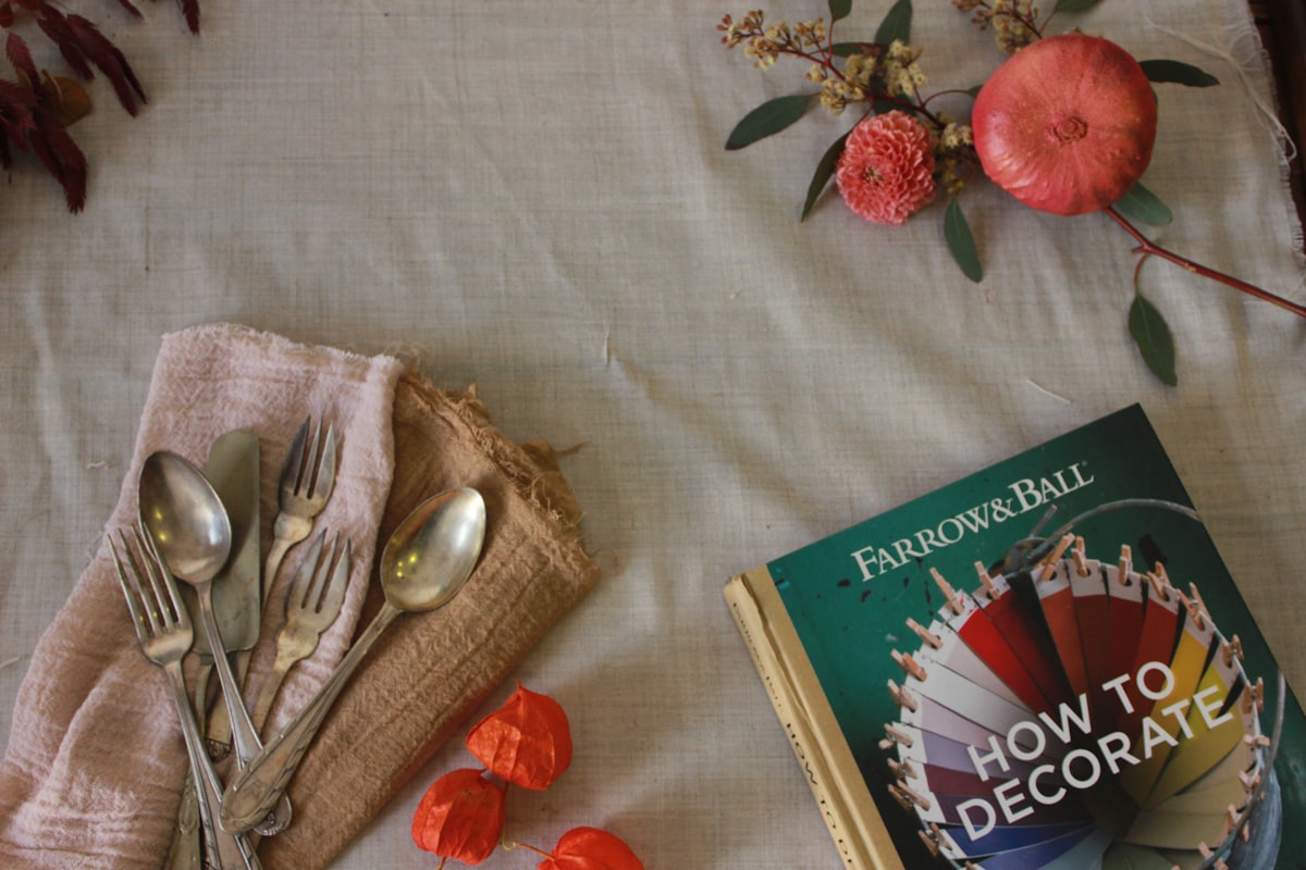 green and white book on white textile related to Fargo's Favorite Home Decor Haven: A Guide to Bed Bath & Beyond