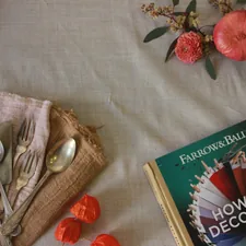 green and white book on white textile related to Fargo's Favorite Home Decor Haven: A Guide to Bed Bath & Beyond
