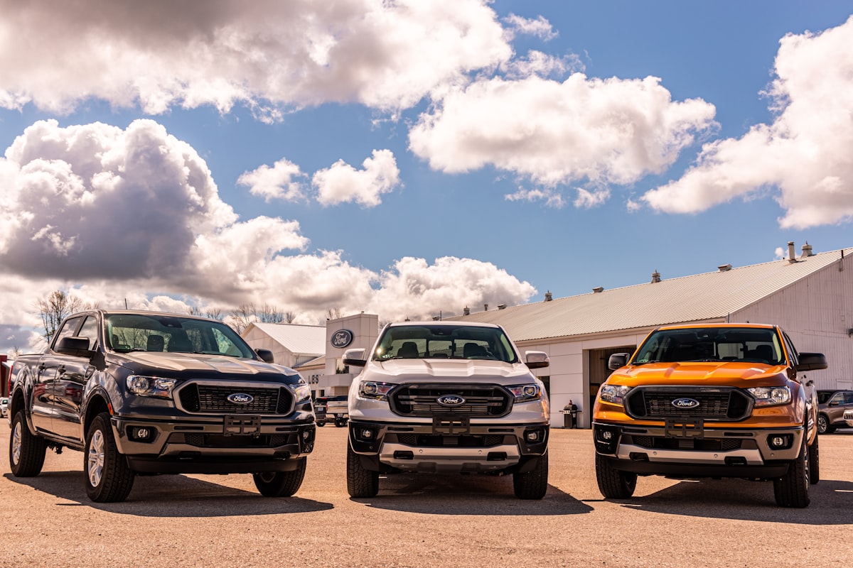 green and yellow chevrolet car on brown sand under blue and white sunny cloudy sky during related to Upgrading Your 2000 Ford F150: Front Bumper Valance Options