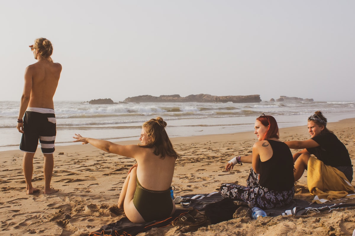 group of people on beach related to Elevate Your Beach Vibes with Stylish Window Valances