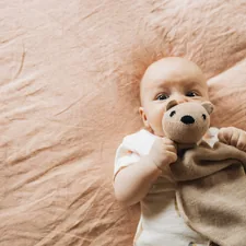 Happiest baby related to Creating a Cozy Nursery with Peach Baby Bedding