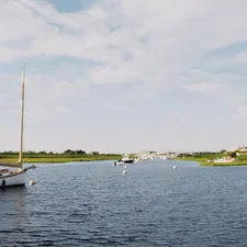Harbor view in Nantucket with sailboats and motorboats related to Discover the Charm of Nantucket: Your Ultimate Bed and Breakfast Guide