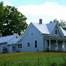 Historic gray and white 2 story farmhouse with multiple additions related to Discover the Charm of Blue Ridge Bed and Breakfast: A Serene Escape