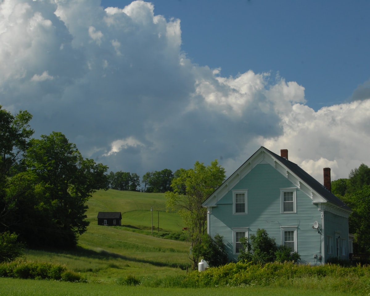 House on a hill related to Discover the Charm of Vermont's Cozy Bed and Breakfasts