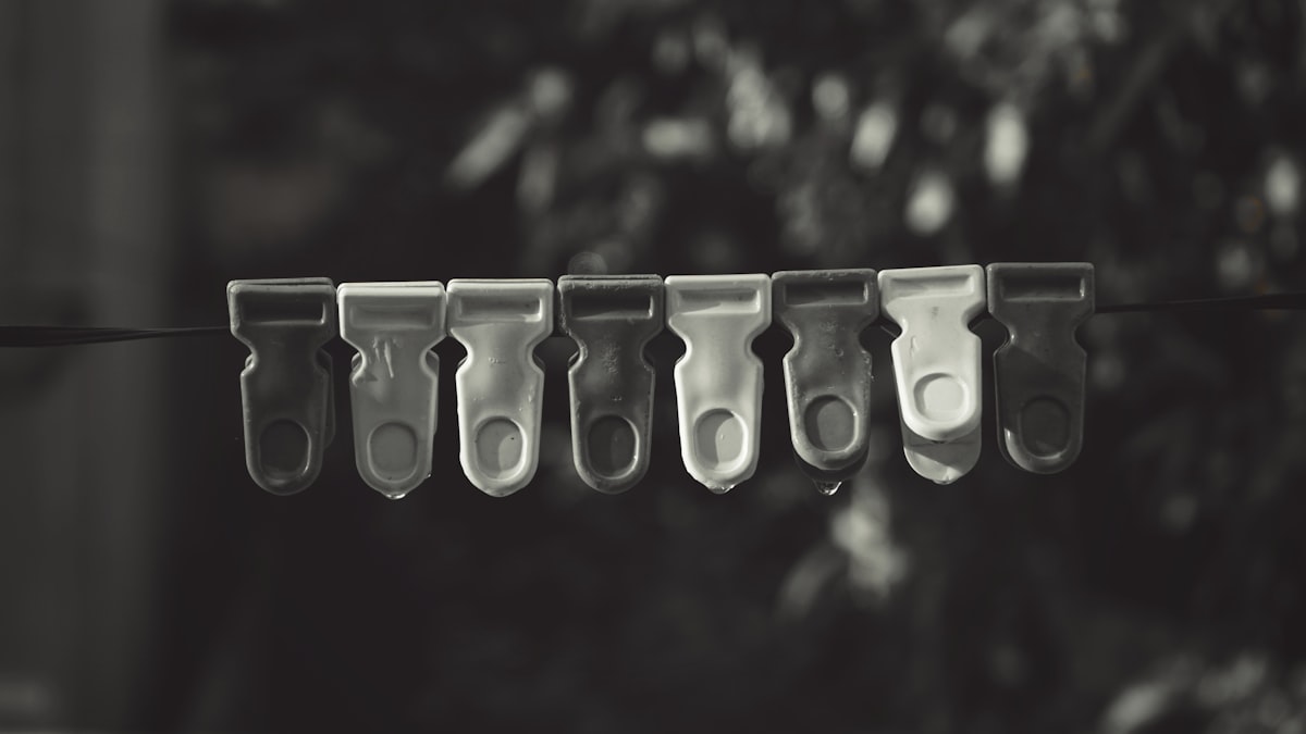 In frame - Cloth clips on a wire. related to Blinds & Valence Clips