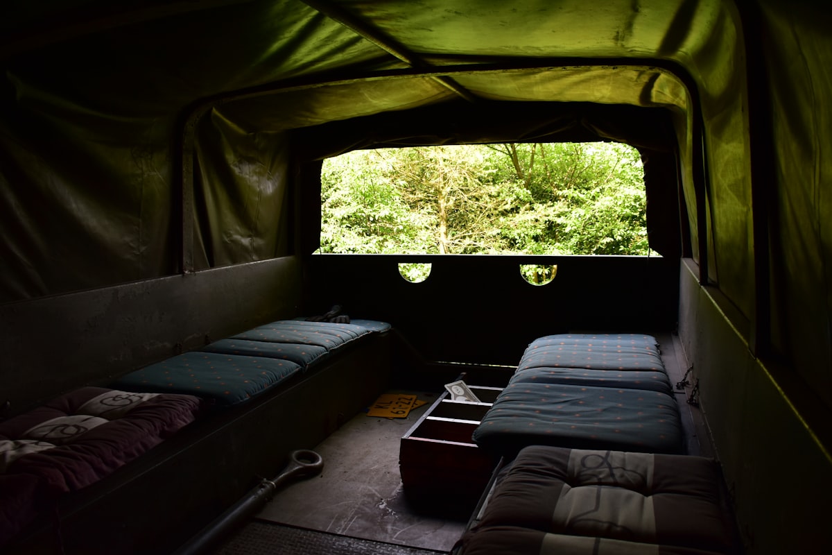 In the back of an army vehicle (Army - Dick van Waert collection) related to Classic Swag Valance: Timeless Elegance for Your Home