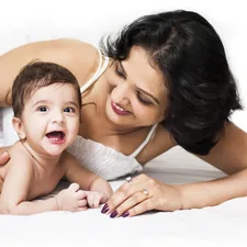 indian mother and baby related to What to Do if Your Baby Falls from the Bed: Immediate Steps and Prevention Tips