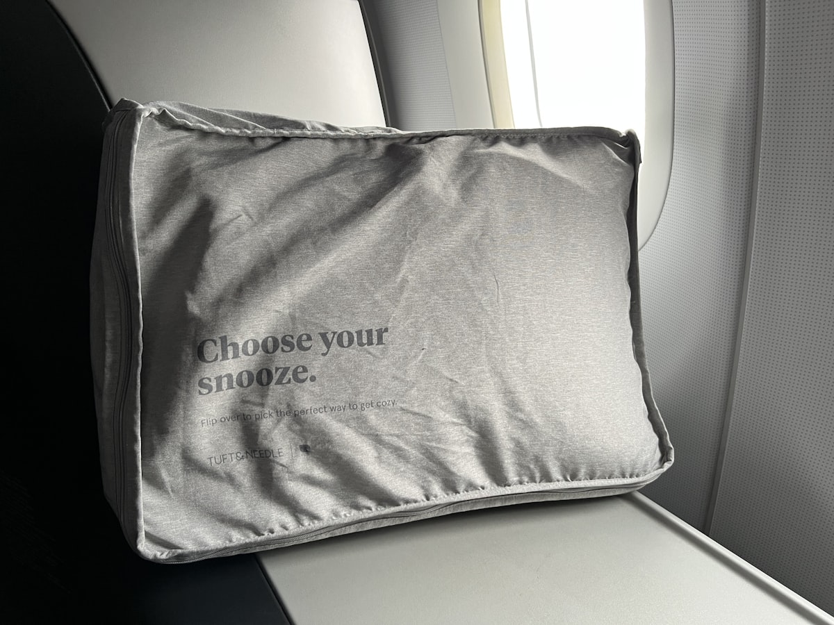 JetBlue Mint business class seat pillow. related to Royal Slumber: Elevate Your Bedroom with Princess Bedding Sets
