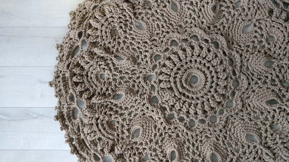 Knitted brown carpet related to Elevate Your Bedroom Décor with Handmade Elegance